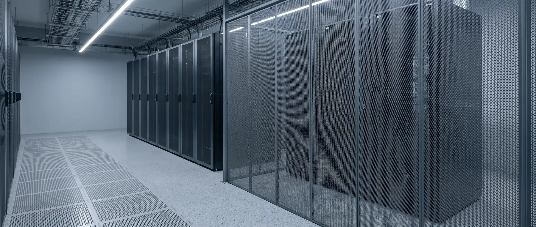 Rows of server racks in a professional data centre